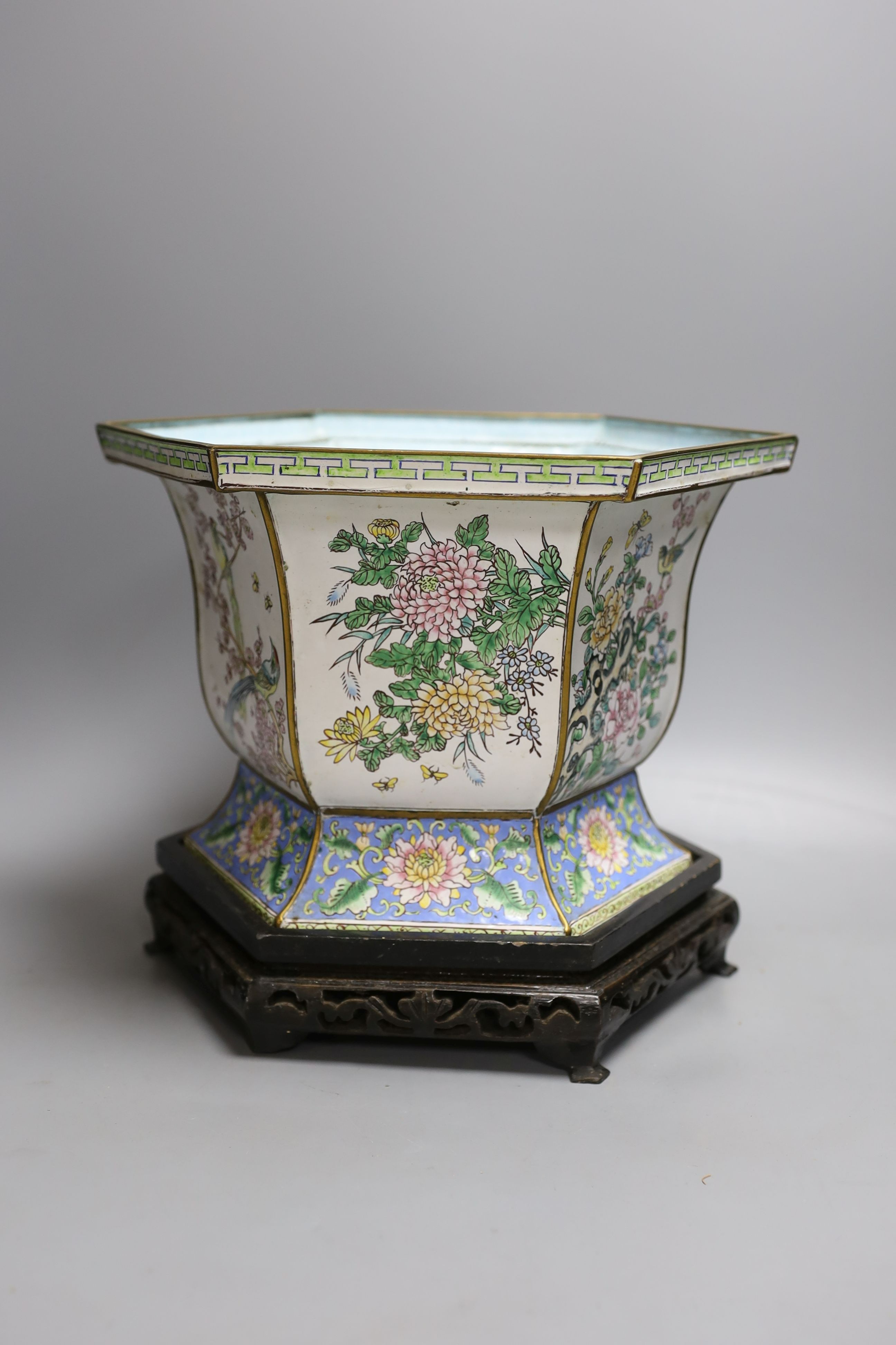 A Chinese Canton enamel jardiniere on hardwood stand, total height 23cm